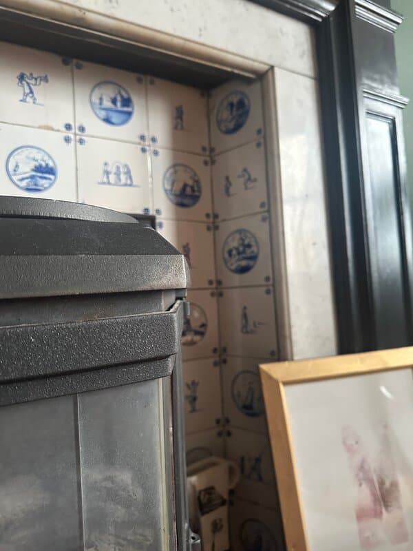 Fireplace with historic electrical fittings