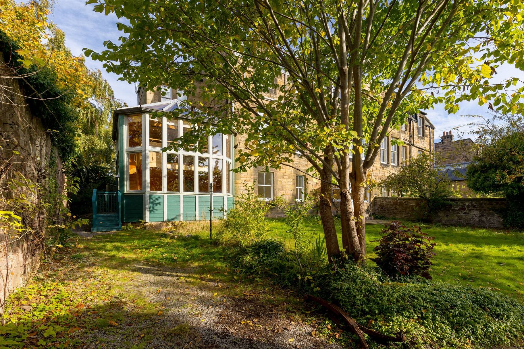 The two-storey conservatory from the back garden