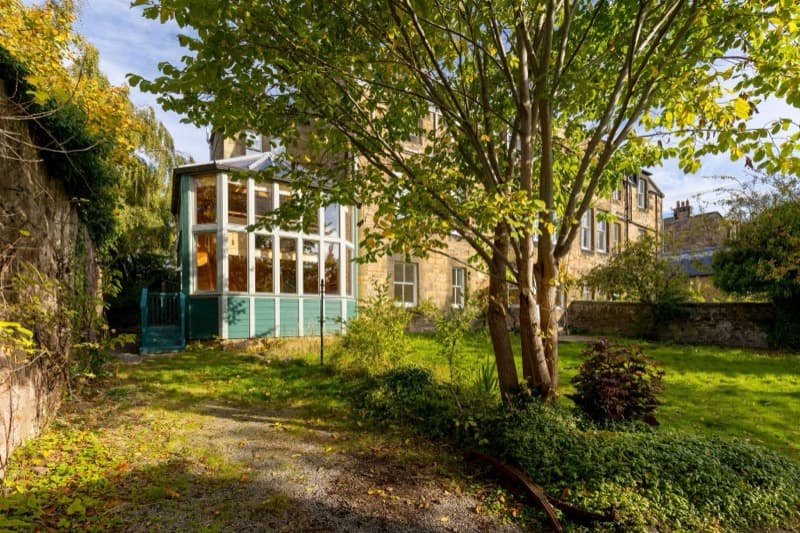 The two-storey conservatory from the back garden